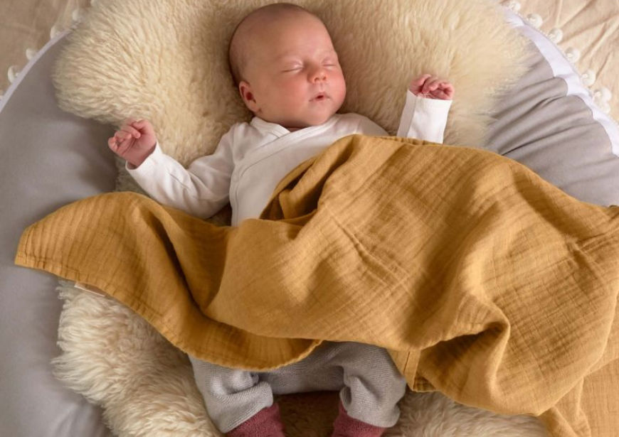 Comment utiliser un lange bébé ? Usages et astuces